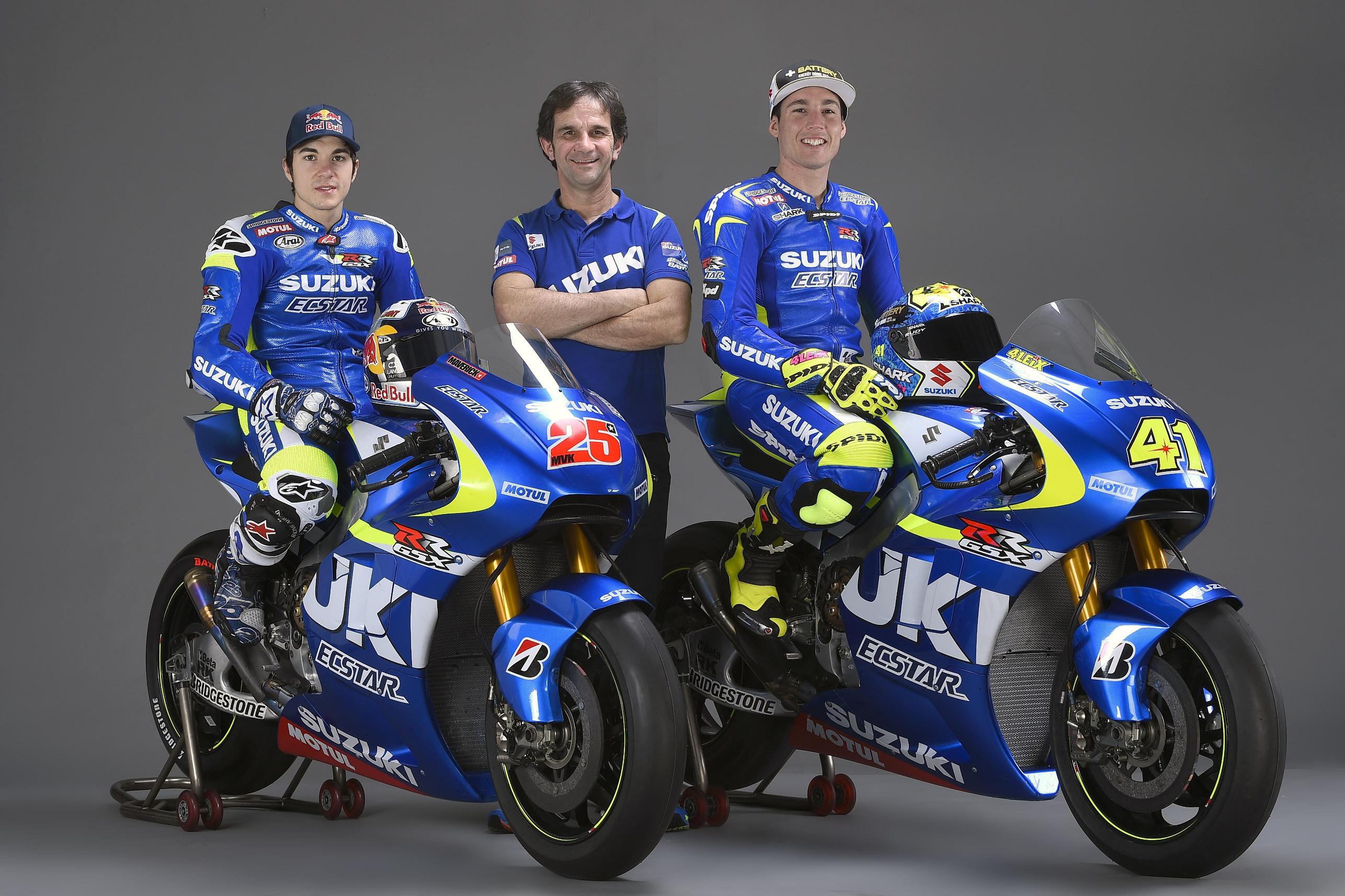 Мотогонки группа. Suzuki MOTOGP Ecstar. Team Suzuki Ecstar MOTOGP. Команда Suzuki Ecstar. Suzuki Moto Race Team.